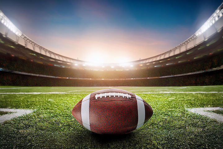 Football field with yard lines showing where ankle support helps players handle cuts, pivots, and contact