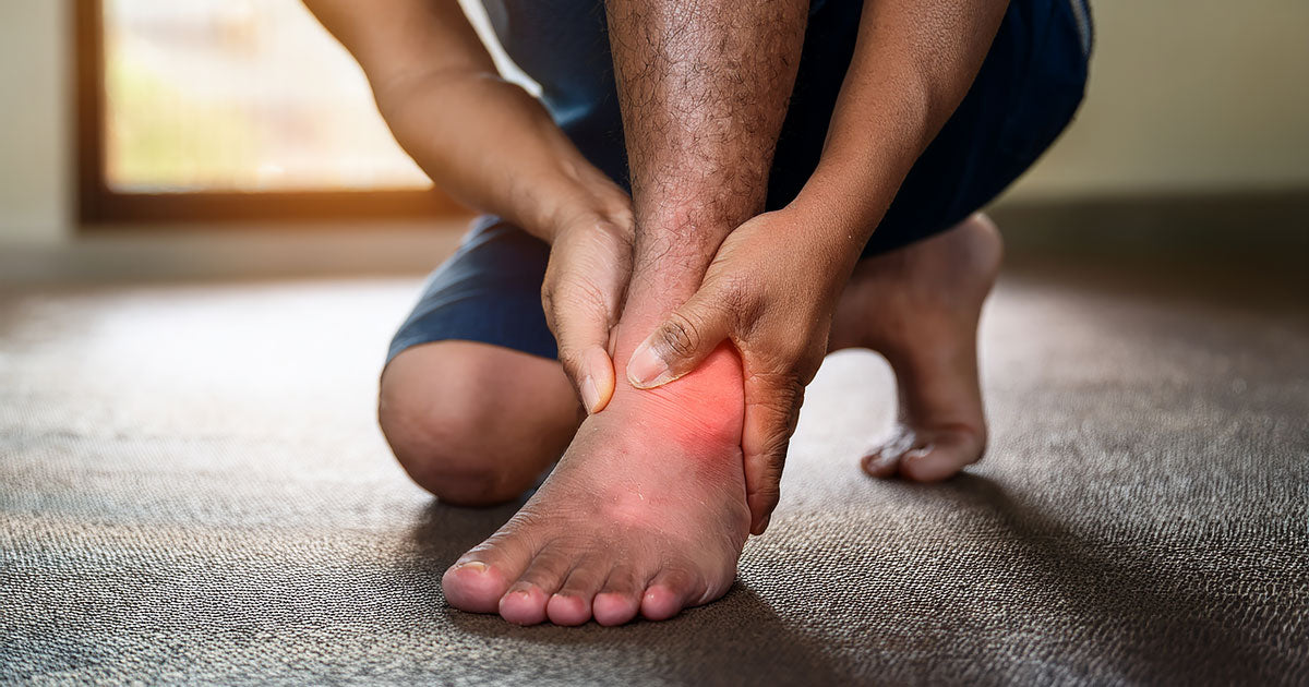 Adult resting with recovering sprained ankle elevated during healing timeline