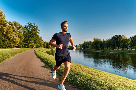 Runner on a park path using ankle support to manage stability during running